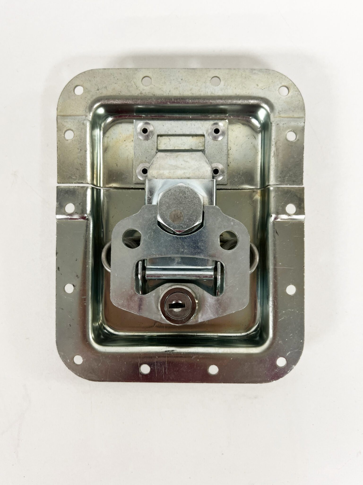 A metal box with a lock on the side.